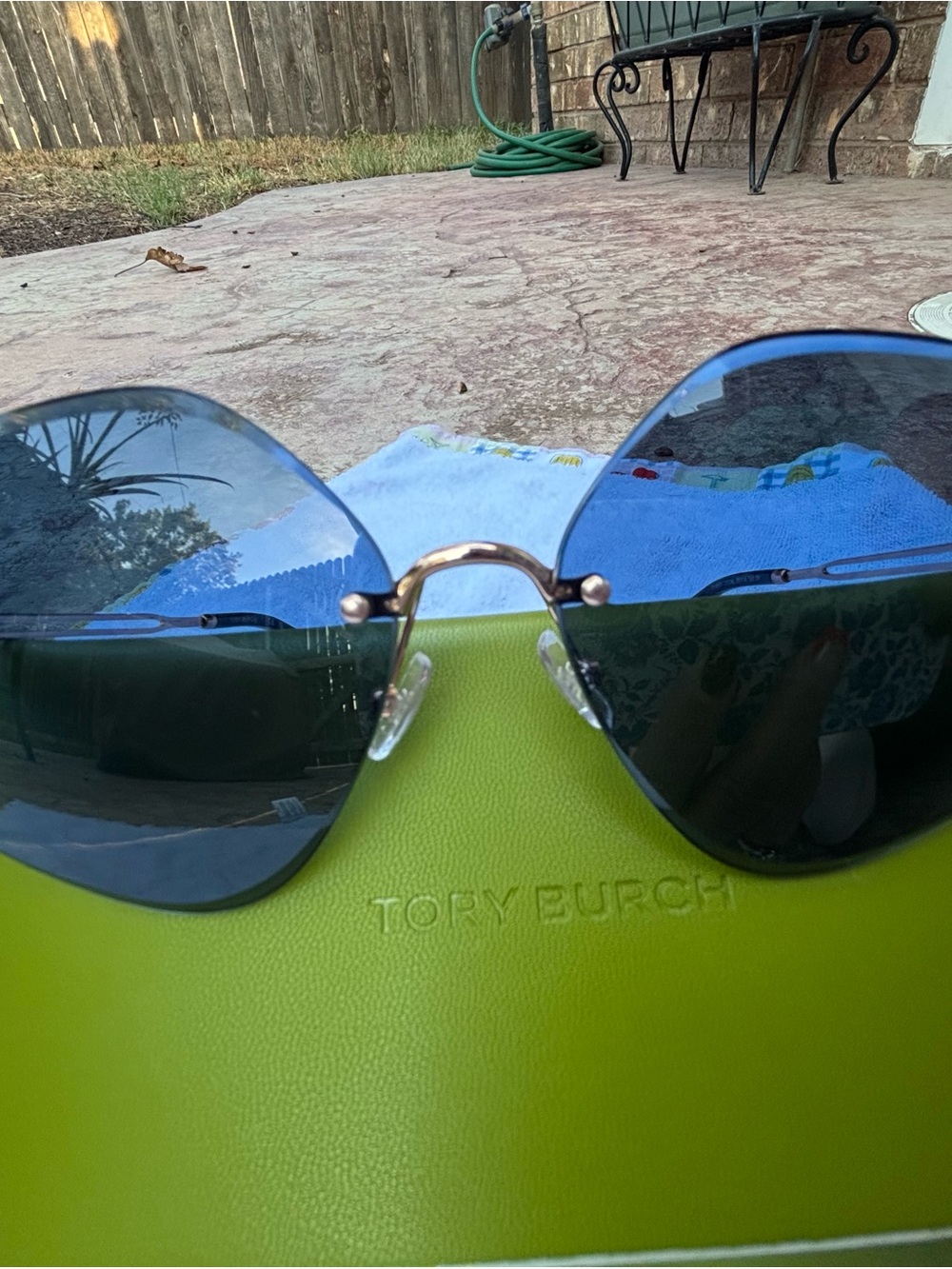 Tory Burch Rimless Geometric Shaped Sunglasses with Blue Lenses and Gold Bridge